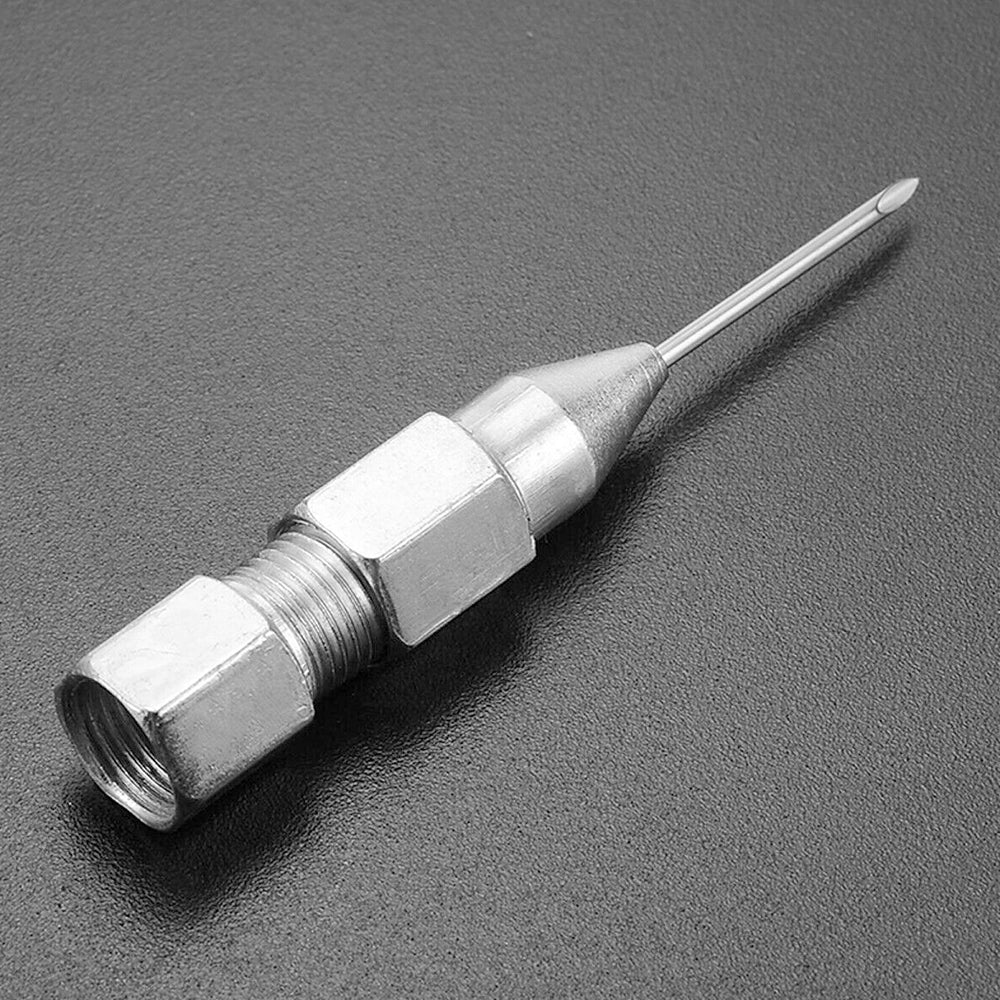 Grease GUN Needle Tip OF The Mouth