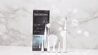 Electric Teeth Cleaning Device